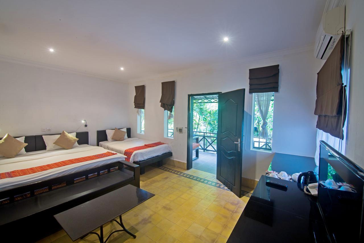 Nature Boutique Residence Ciudad de Siem Riep Habitación foto